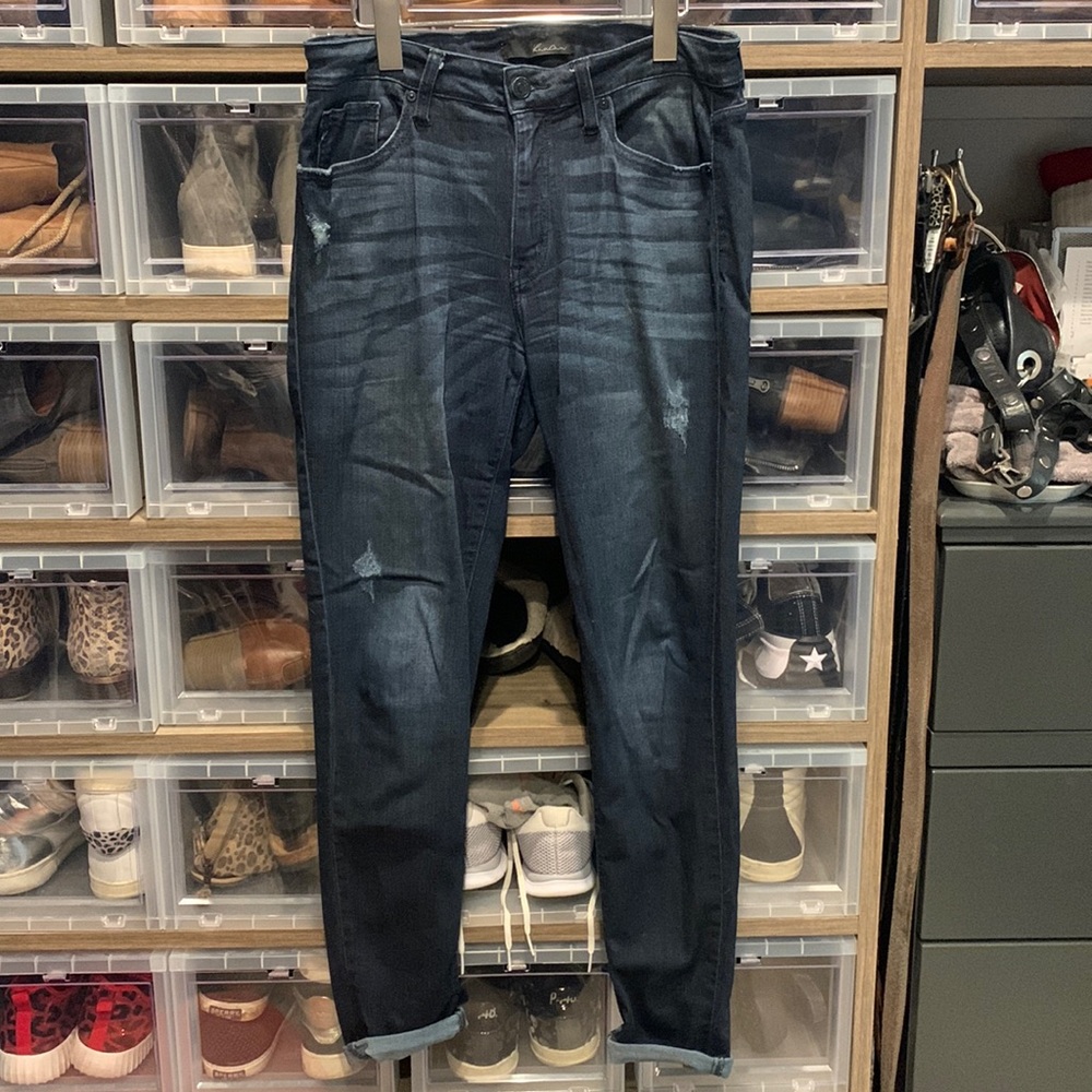 Kancan dark washed jeans. The size is 11/29. There is distressing but minimal